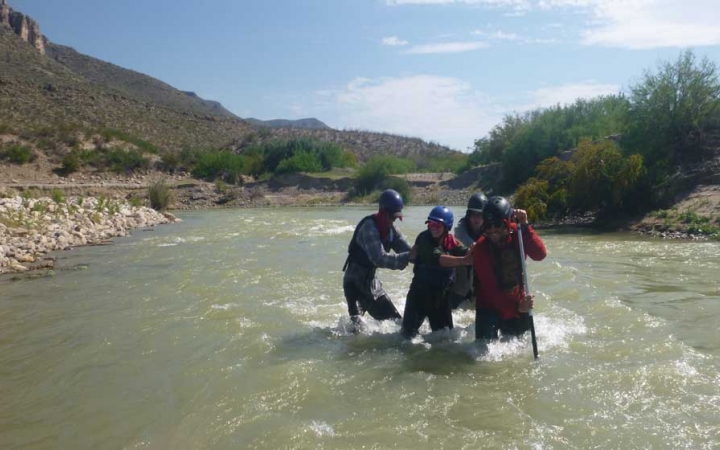 young adults canoeing trip in texas